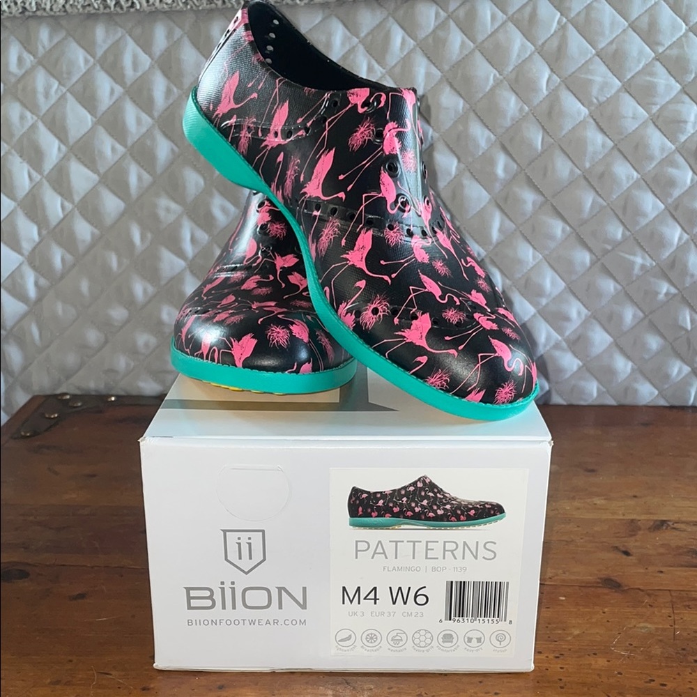 Black and Pink Athletic Shoes with Camouflage Design